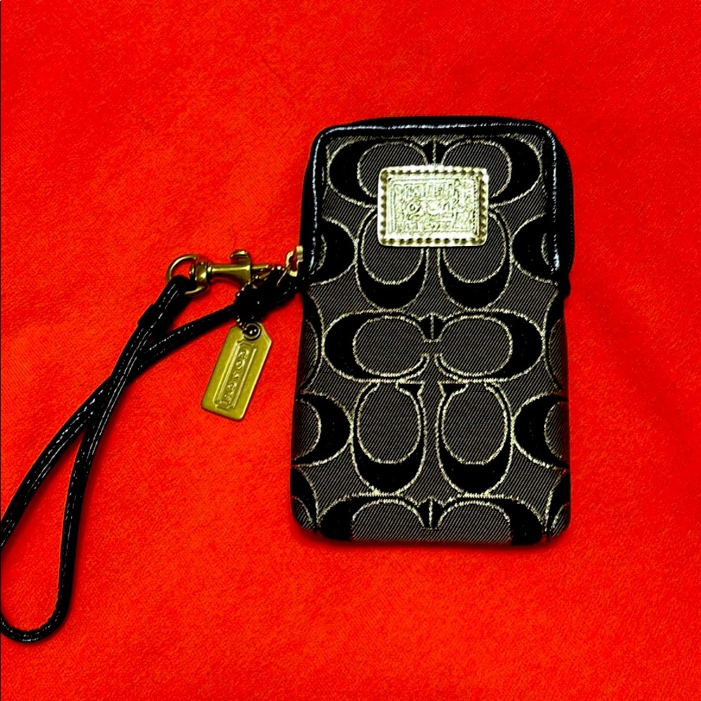 Signature Coach Poppy Phone Wristlet Wallet. 5.5 x 3.5, Black, grey and gold